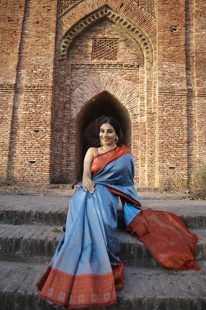 Luminous Pure Silk Firozi Maroon Banarasi with Gleaming Copper Zari Stunning Drape & Rich Brocade